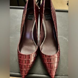 Burgundy snakeskin-like pumps
